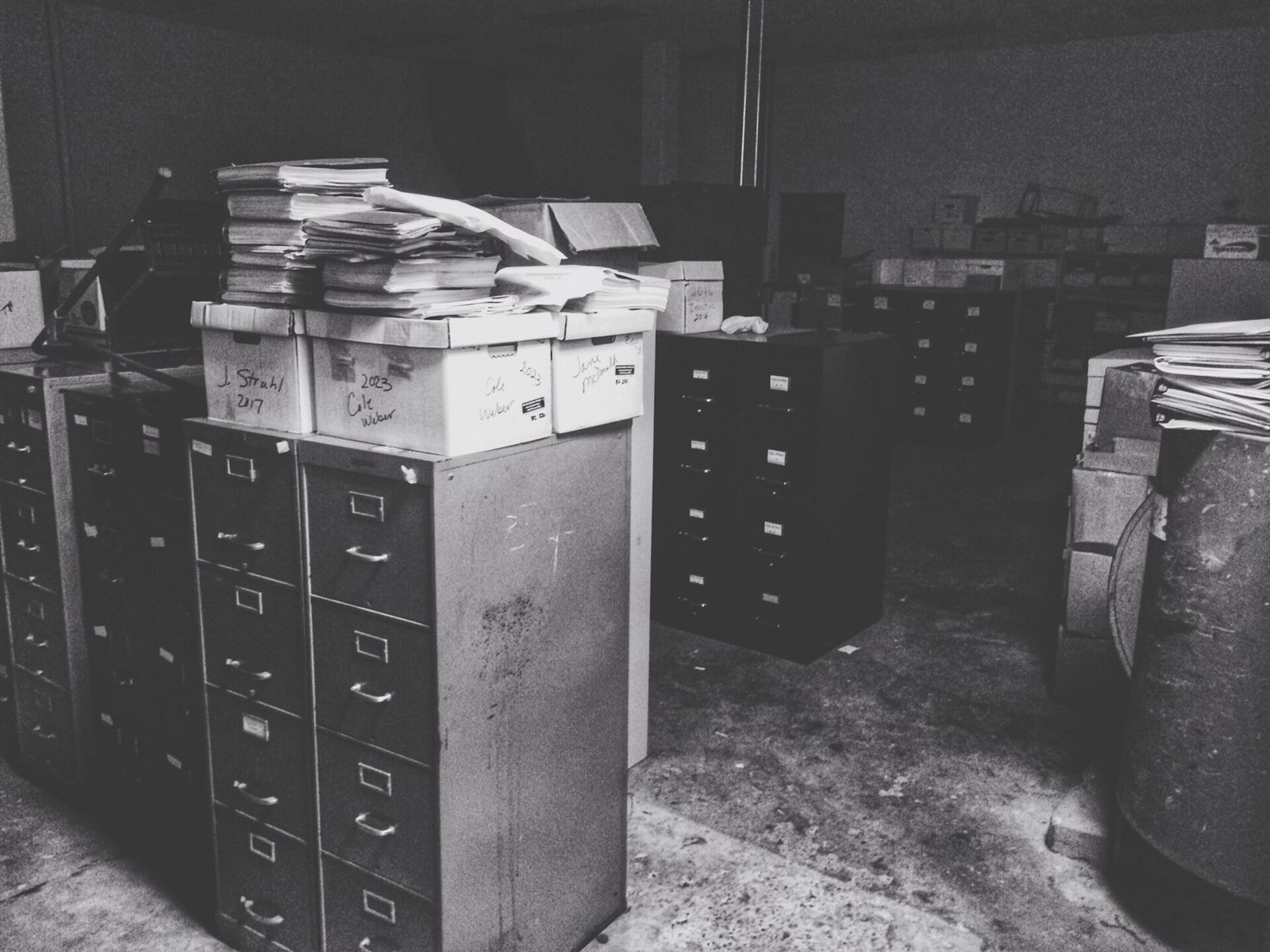 Folders kept in a filing cabinet